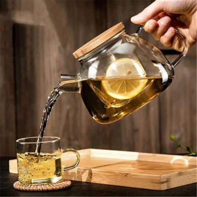 Bicchiere per succhi di bevande in vetro trasparente ad alta borosilicato con acqua fredda e con manico e coperchio